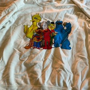 White Uniqlo x kaws sweater